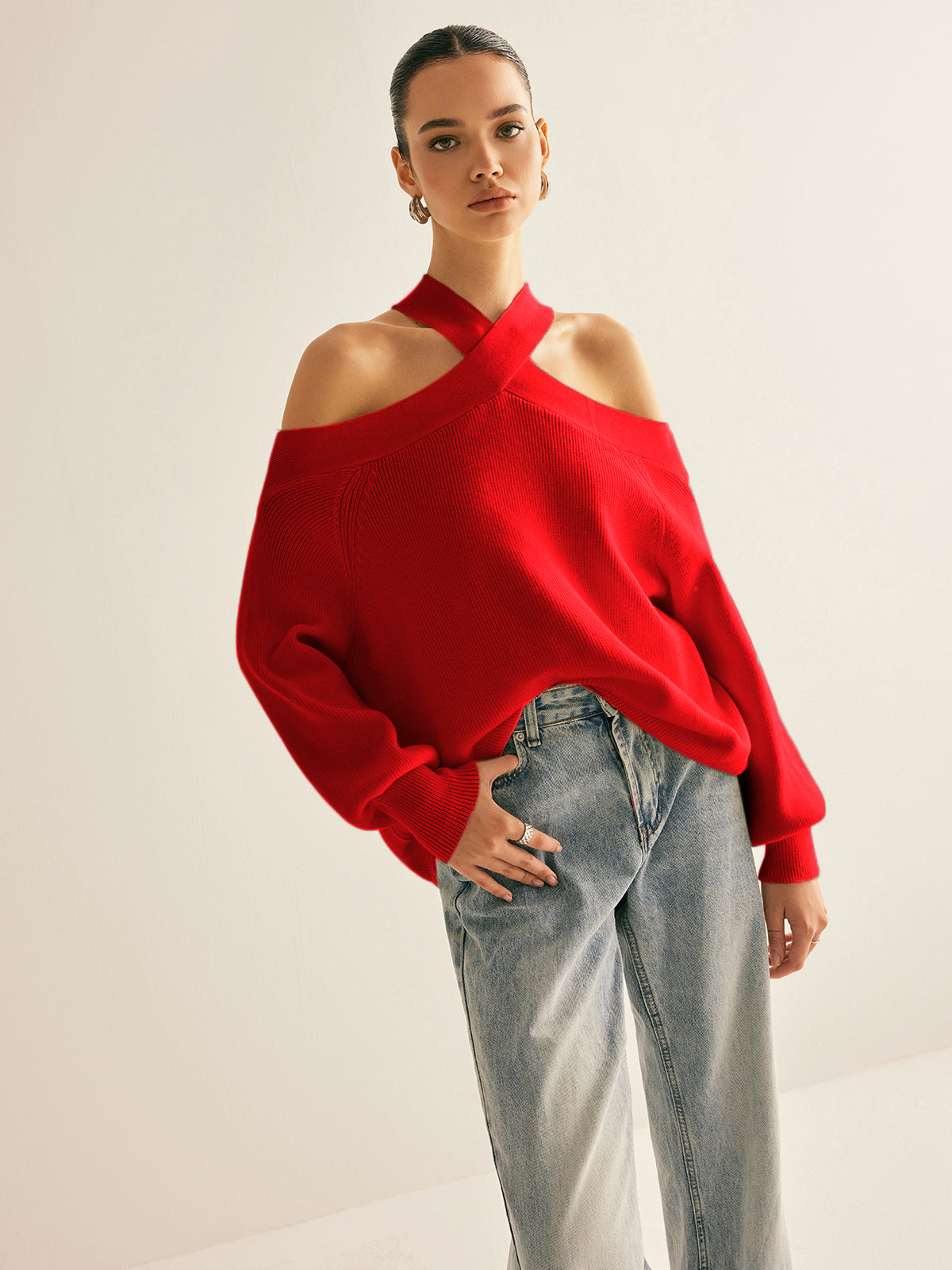 Women's beige cold shoulder crossover collar knit sweater with halter neckline and elegant casual fit