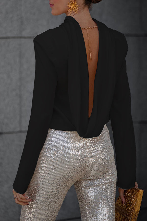 Women's black long sleeve top with elegant draped back cutout design for evening parties