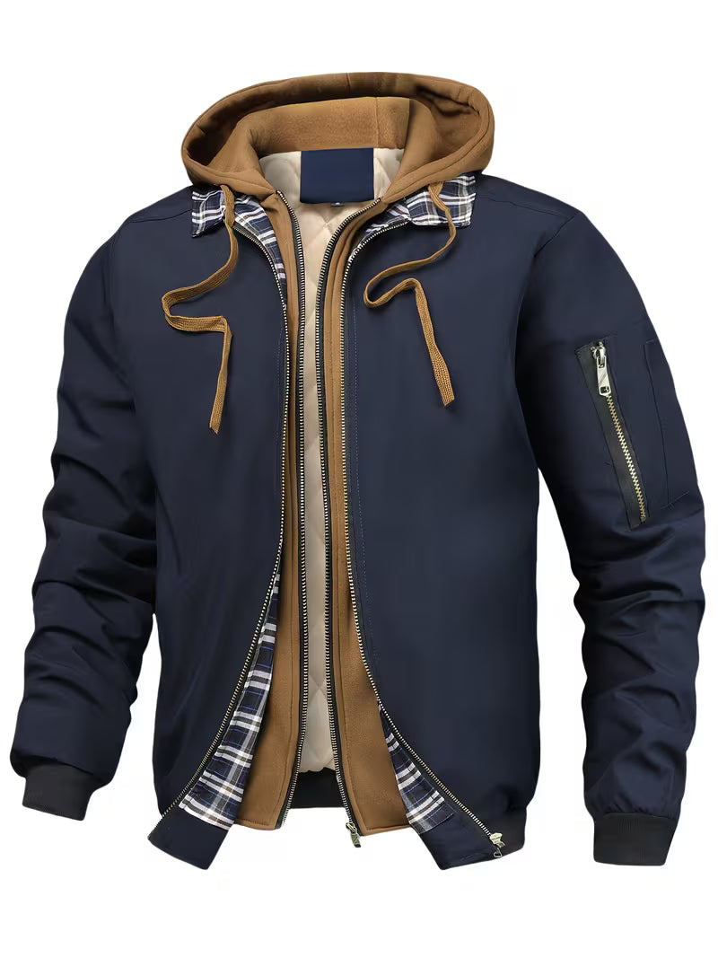 Dark urban parka with plaid interior lining, quilted dual-layer construction, and utility outer shell