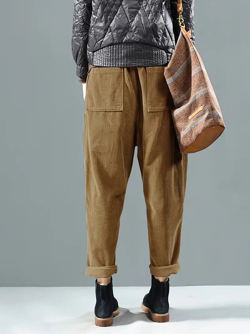 Women's brown corduroy high-rise straight-leg trousers with textured ribbed finish