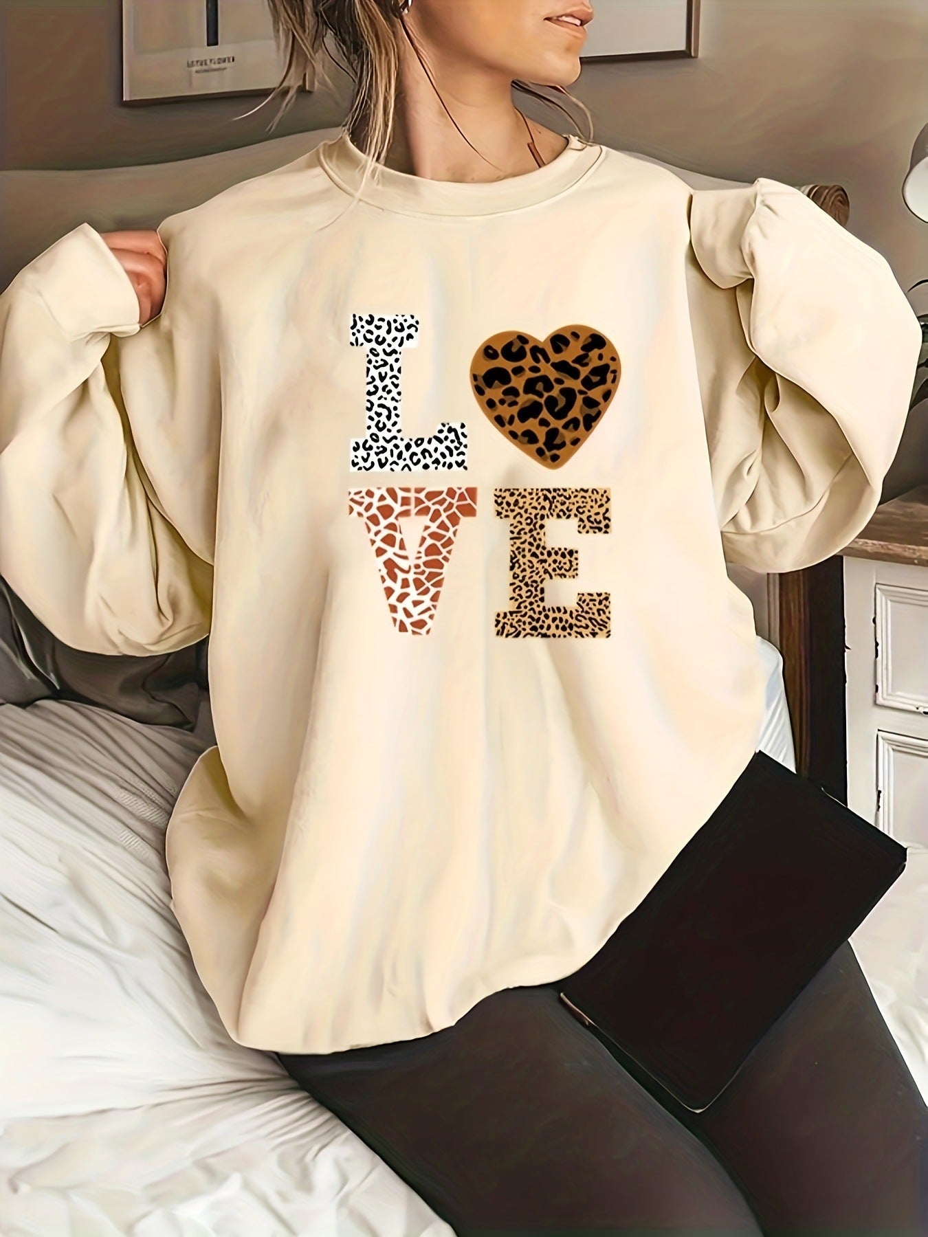 Women's leopard print crew neck sweater, chic everyday knitwear with eye-catching animal pattern