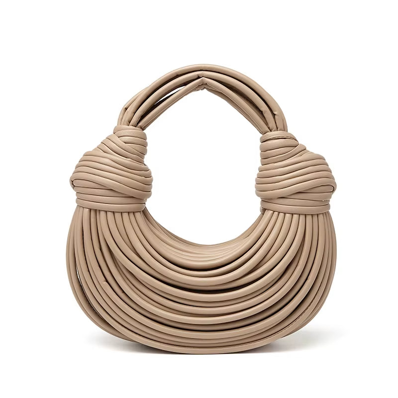 Artemis sculptural vegan leather handbag metallic sheen detachable crossbody strap statement silhouette
