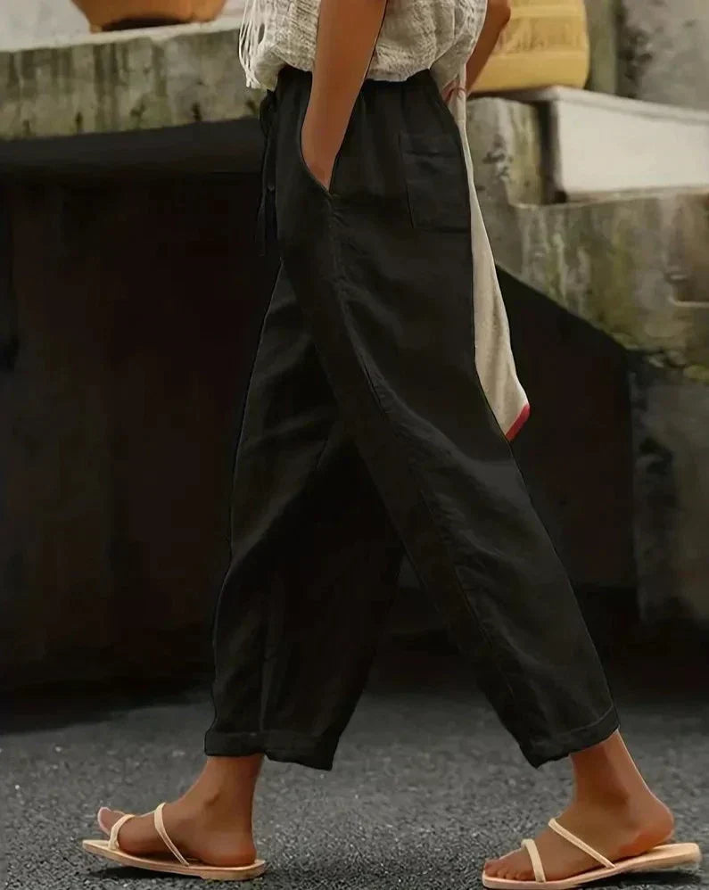 Women's relaxed-fit breathable cotton pants in neutral tone with elastic waistband for all-day comfort