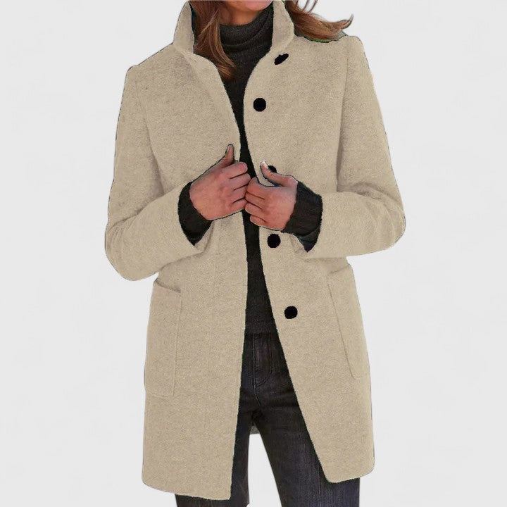 Women's mid-length structured coat in elegant cut with refined tailoring for daily warmth and versatility