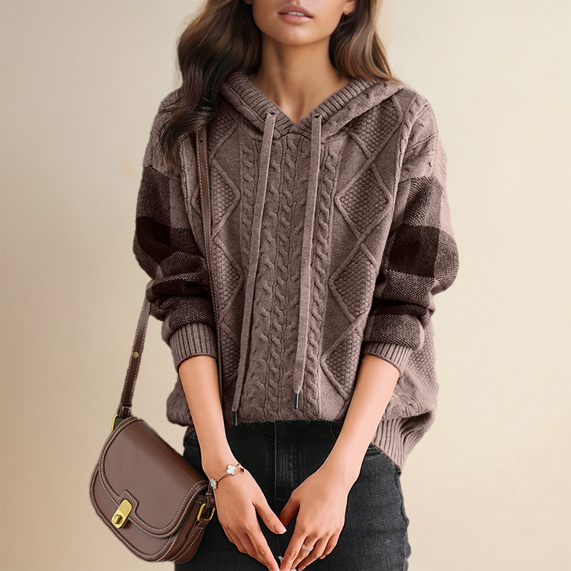 Beige cable knit hoodie sweater with intricate textured pattern and relaxed cozy fit for casual wear