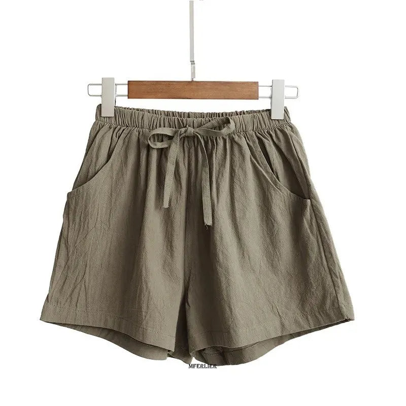 Plus size high-waisted linen shorts in natural beige, vintage-inspired silhouette with breathable cotton-linen blend