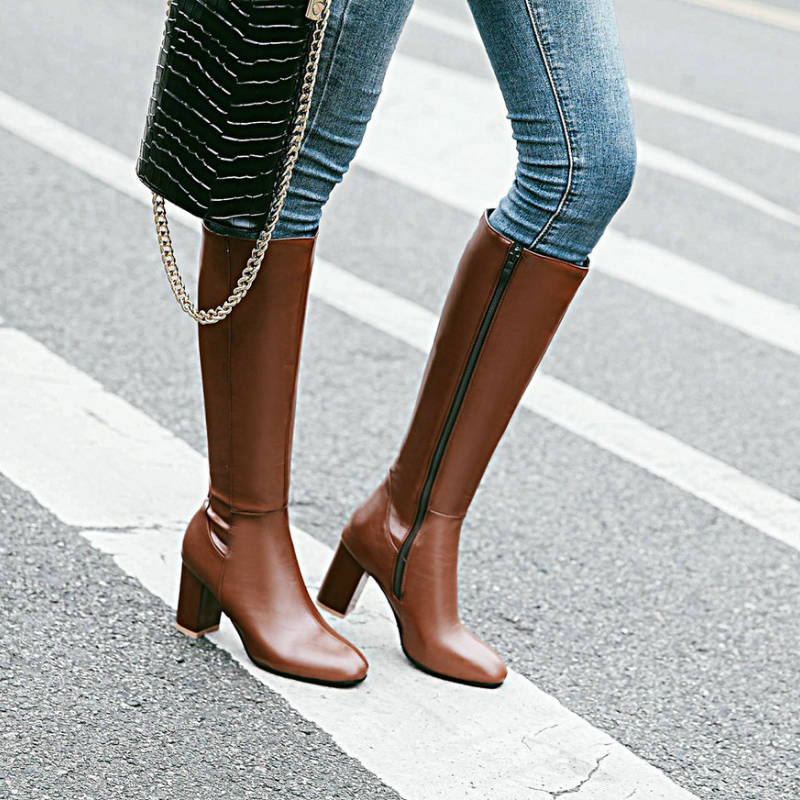 Mia women's black knee-high boots with sleek block heel, elegant silhouette for confident style