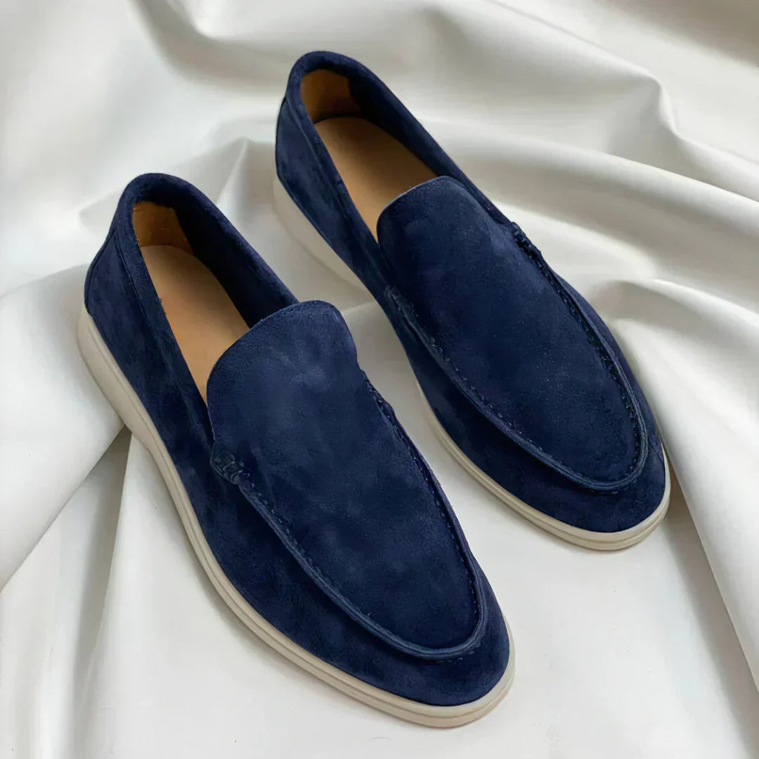 White minimal slip-on loafer sneakers low platform cushioned interior versatile everyday style