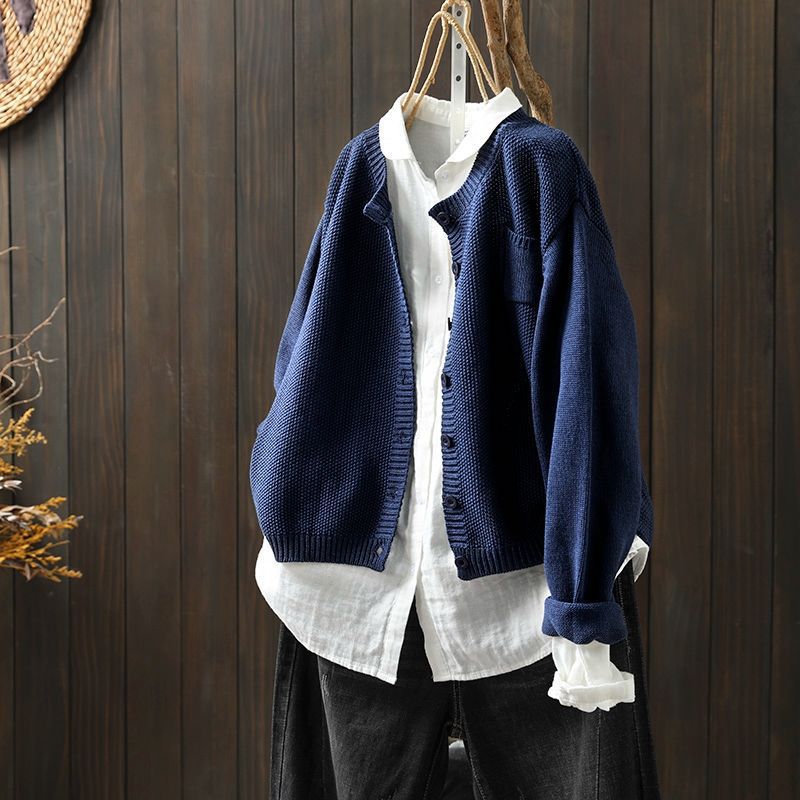 Women's relaxed fit cozy knit cardigan with button detail, versatile layering essential