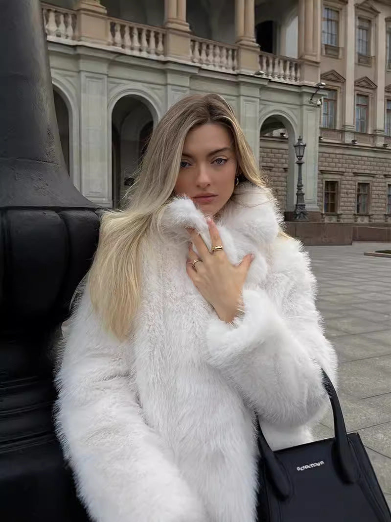 Women's short faux fur coat tailored fit plush soft material elegant chic silhouette