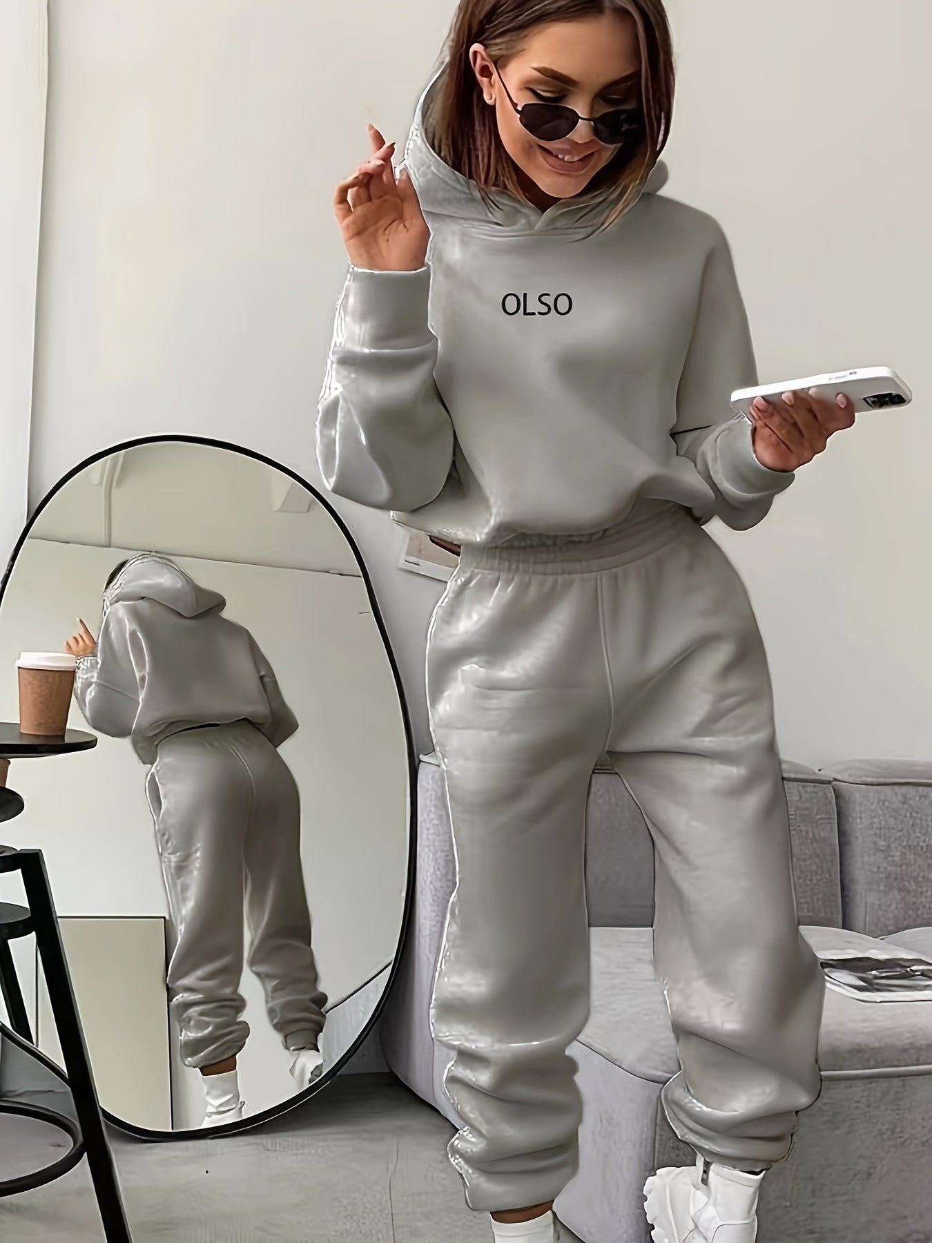 Women's coordinated hoodie and sweatpants tracksuit set in sustainable fabric for everyday casual wear