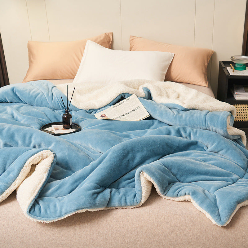 Reversible sherpa flannel throw blanket in neutral tones with dual-texture cozy design for home lounging