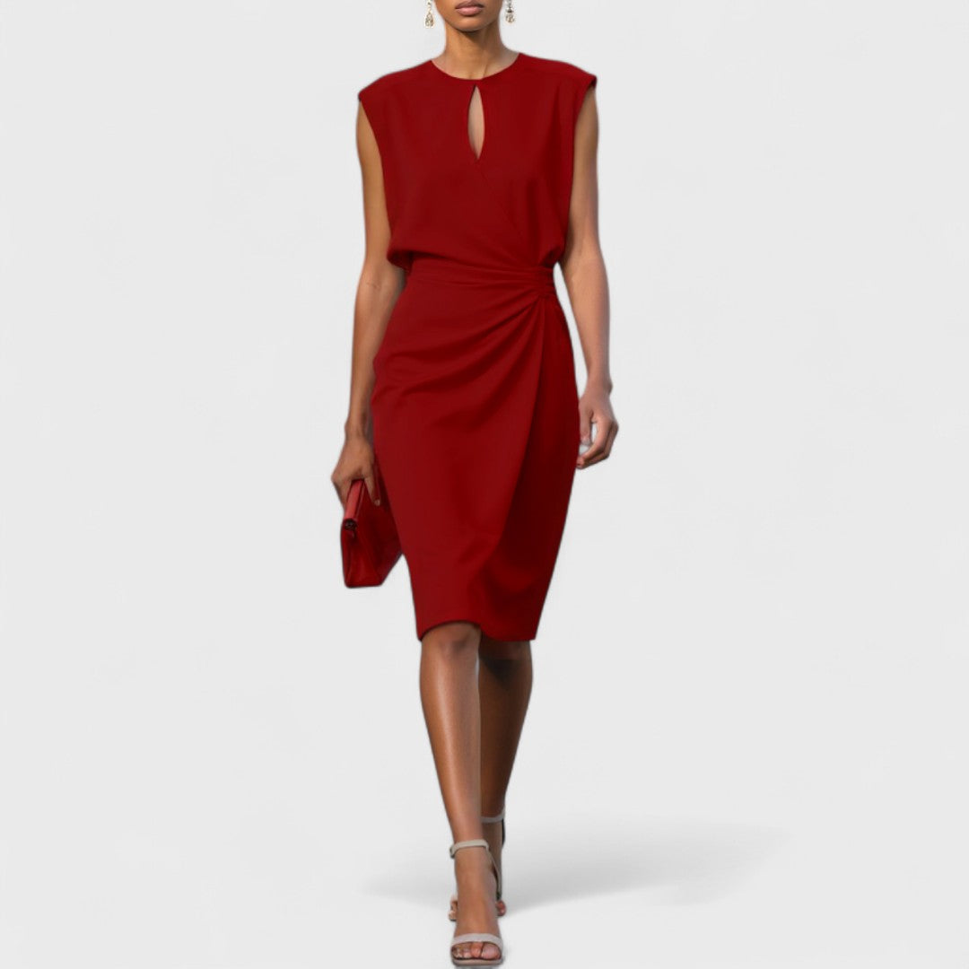 Sleeveless midi dress with ruched waist, keyhole neckline, and fluid skirt for elegant occasions