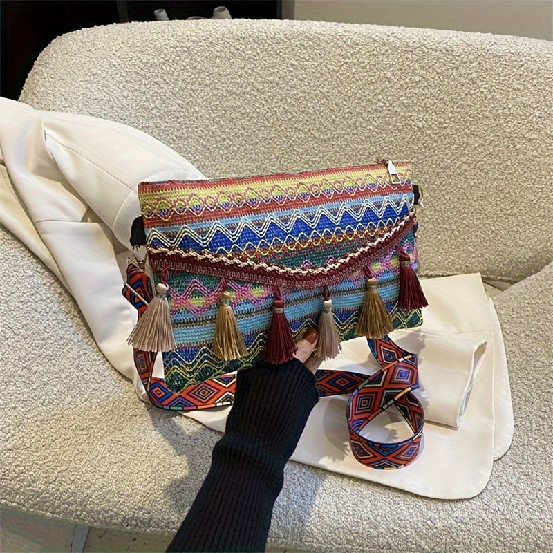 Boho crossbody bag with geometric jacquard weave, layered tassel fringe, and adjustable strap