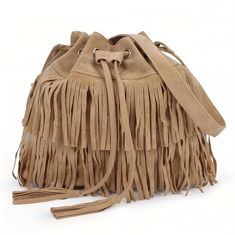 Boho chic tan faux suede fringe bucket bag with drawstring closure and adjustable crossbody strap
