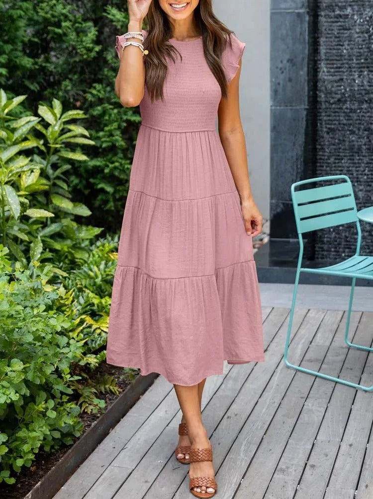 Women's lightweight summer dress with ruffle accents, functional pockets, sustainable fabric, versatile style