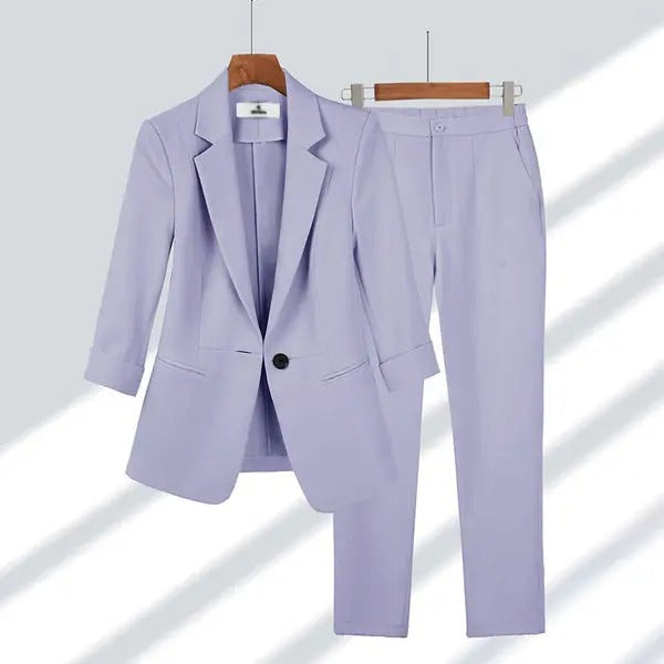 Women's tailored blazer and pants set in timeless silhouette, polished two-piece coordinated suit