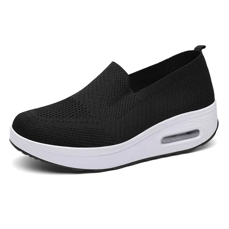 Women's white breathable mesh platform sneakers with orthopedic cushioned insole and slip-on design