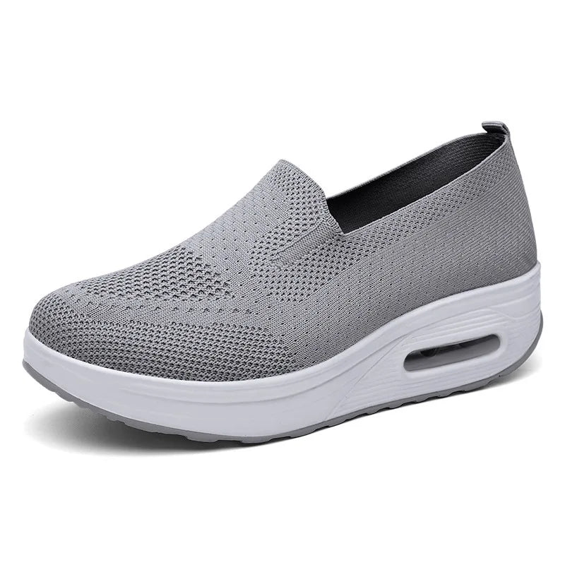 Women's white breathable mesh platform sneakers with orthopedic cushioned insole and slip-on design