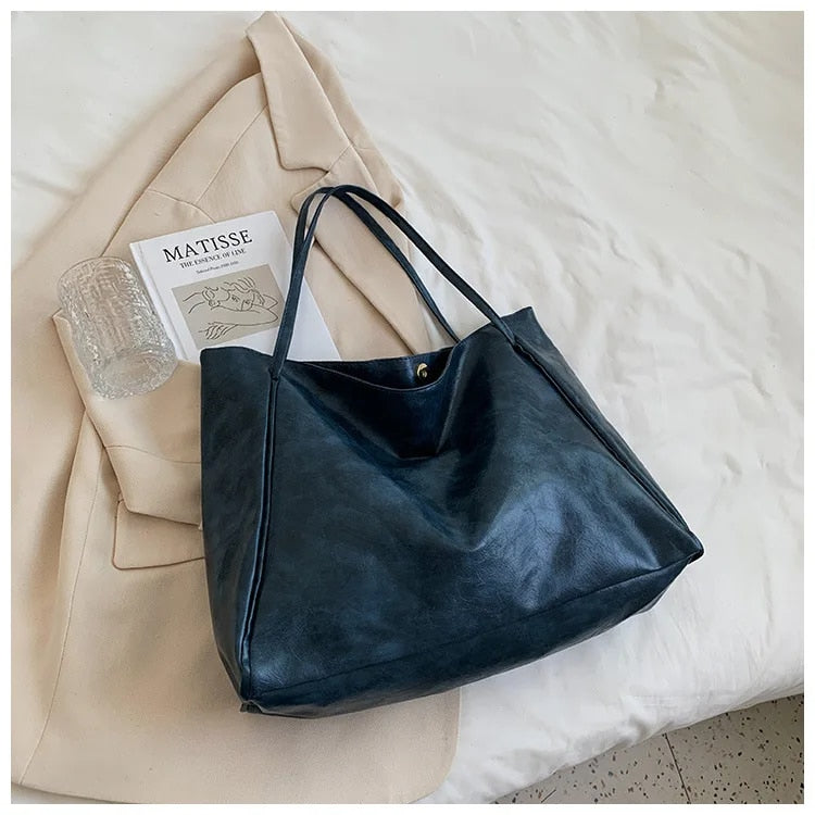 Clara retro vintage handbag for women, elegant spacious design with timeless silhouette
