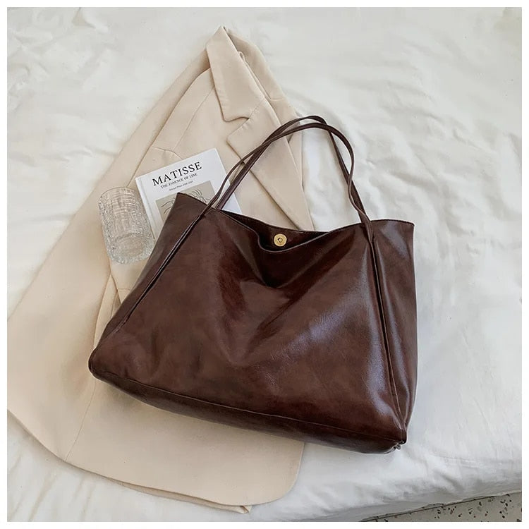 Clara retro vintage handbag for women, elegant spacious design with timeless silhouette