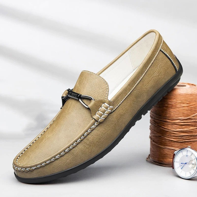 Men's brown genuine leather penny loafers with classic silhouette and double stitching detail