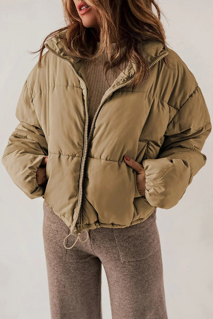 Women's lightweight quilted puffer jacket adjustable hood side pockets everyday outdoor wear