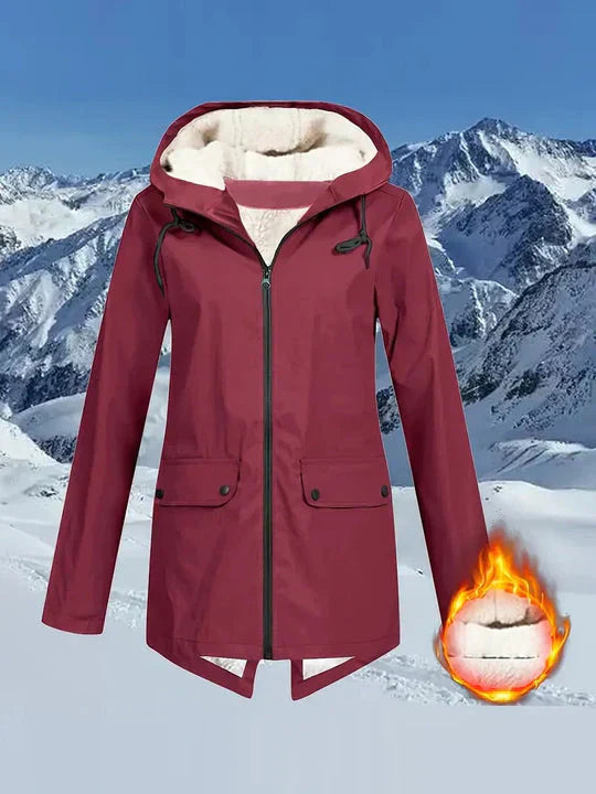 Waterproof hooded jacket with fleece insulation, cozy outdoor style for cold wet weather adventures