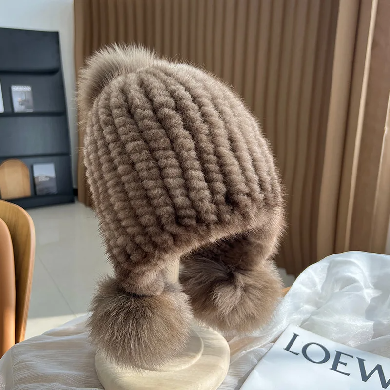 Women's warm ribbed knit fur beanie with plush pom poms, luxurious winter hat in cozy style