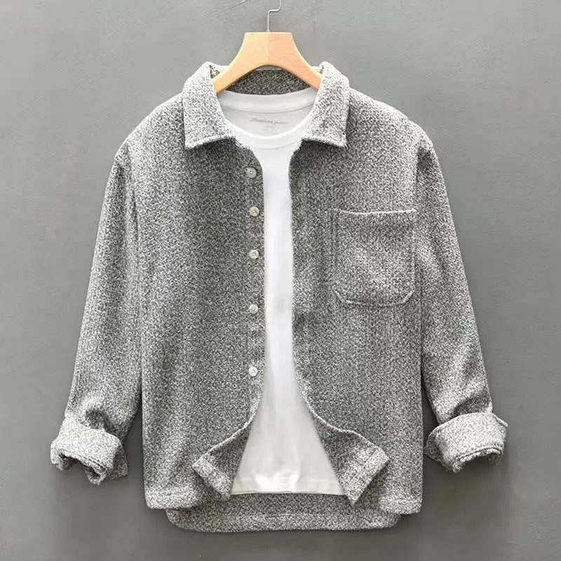 Ivory cashmere-blend button-up shirt with grainy texture, relaxed smart casual cut for everyday wear