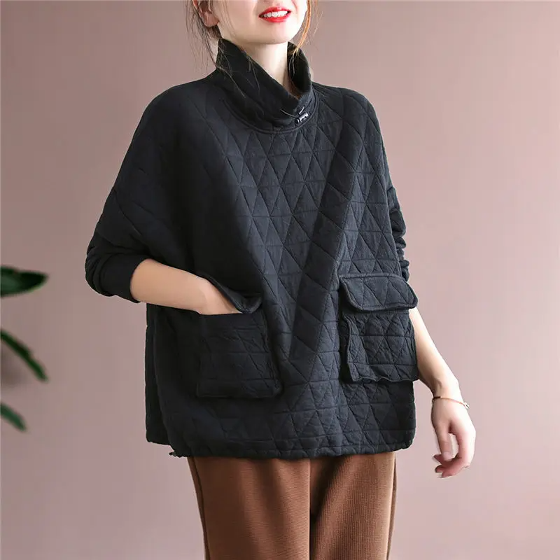 Women's ivory oversized quilted pullover, diamond texture, high neck, drawstring waist, flap pockets