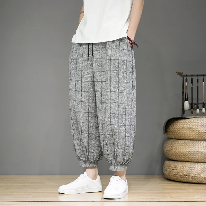 Unisex relaxed-fit linen trousers in grid pattern, breathable cotton-linen blend for warm-weather wear