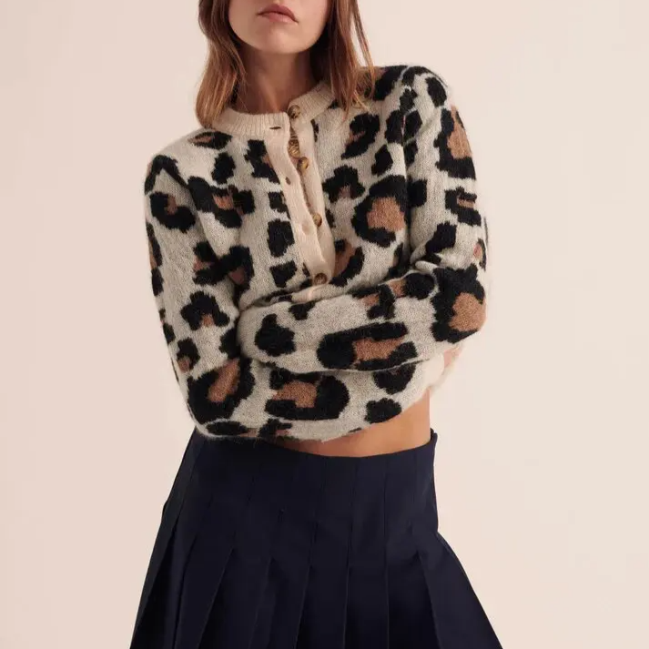 Women's leopard print knit cardigan with bold contrast stripes and plush textured fabric