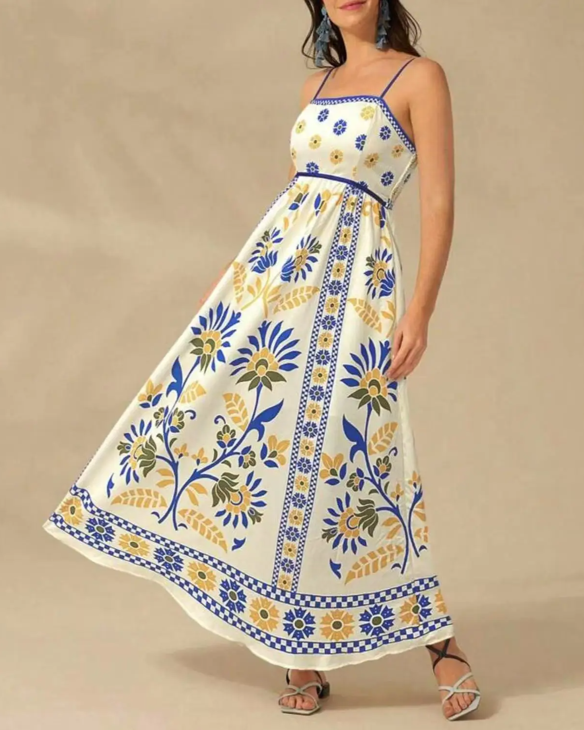Women's boho floral maxi dress in sunset tones, A-line silhouette with delicate strap neckline