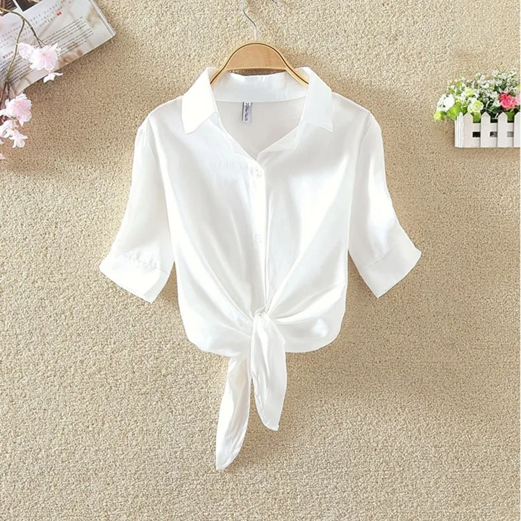Crisp white cropped cotton linen blouse with bow-front tie detail, polished office-ready workwear top