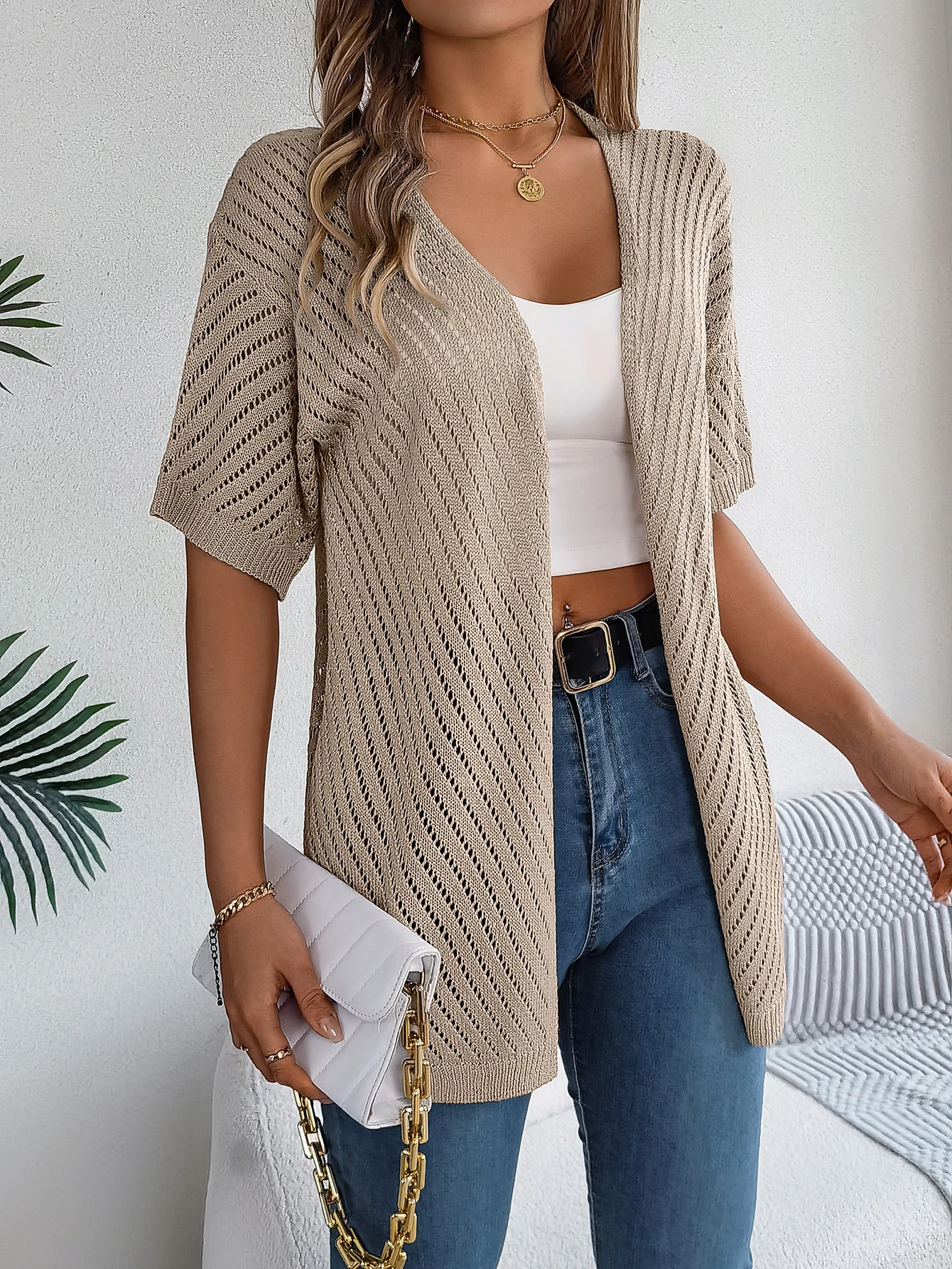 Women's lightweight open-front chevron knit cardigan with breathable drape and bold textured pattern