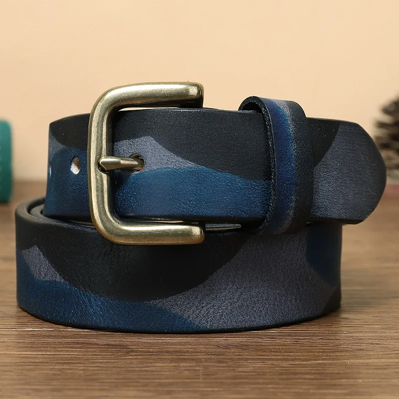 Rugged camo-embossed full-grain leather belt with heavy-duty brass buckle, military-inspired outdoor style