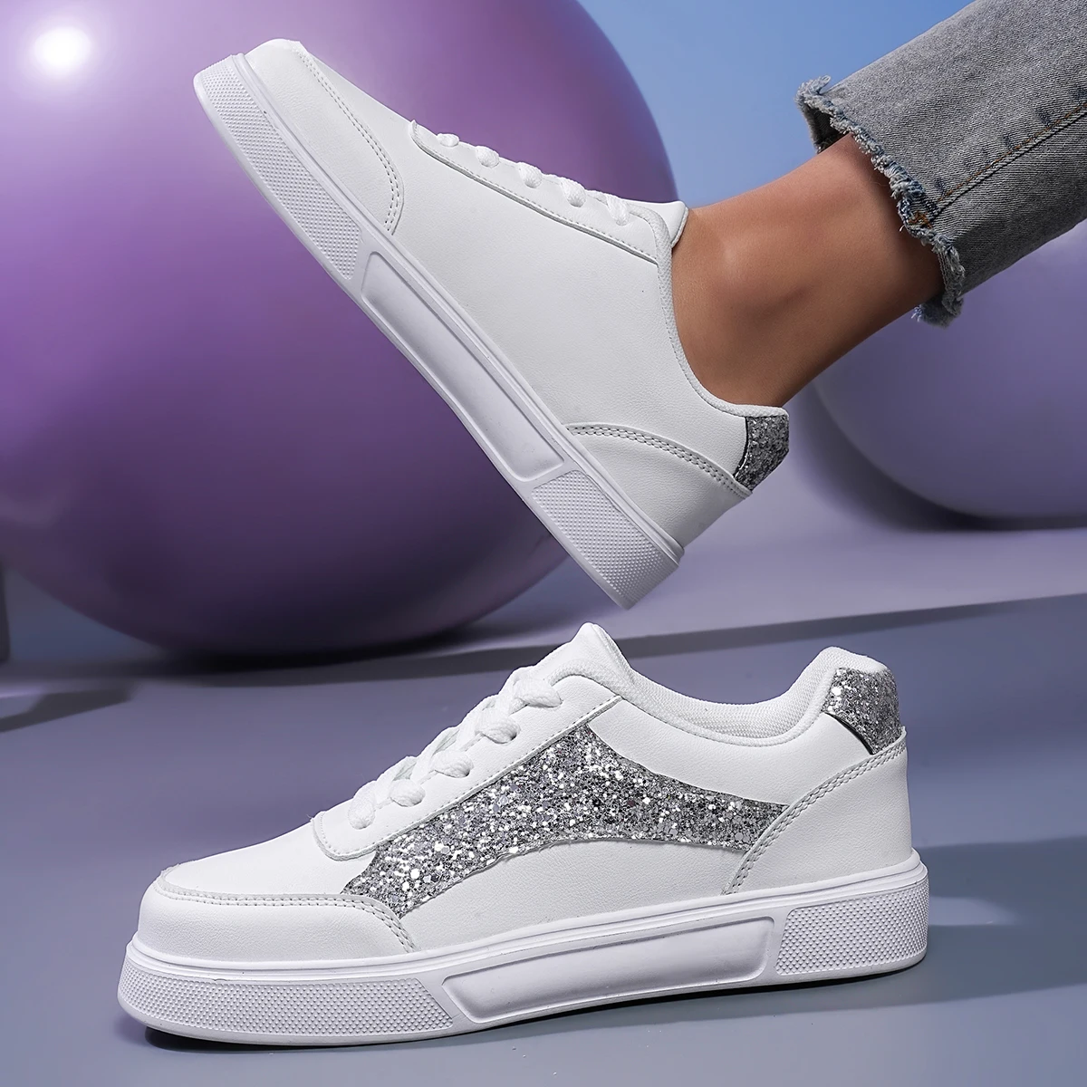 Women's silver shimmer panel chunky sole sneaker with iridescent accents and bold fashion-forward silhouette