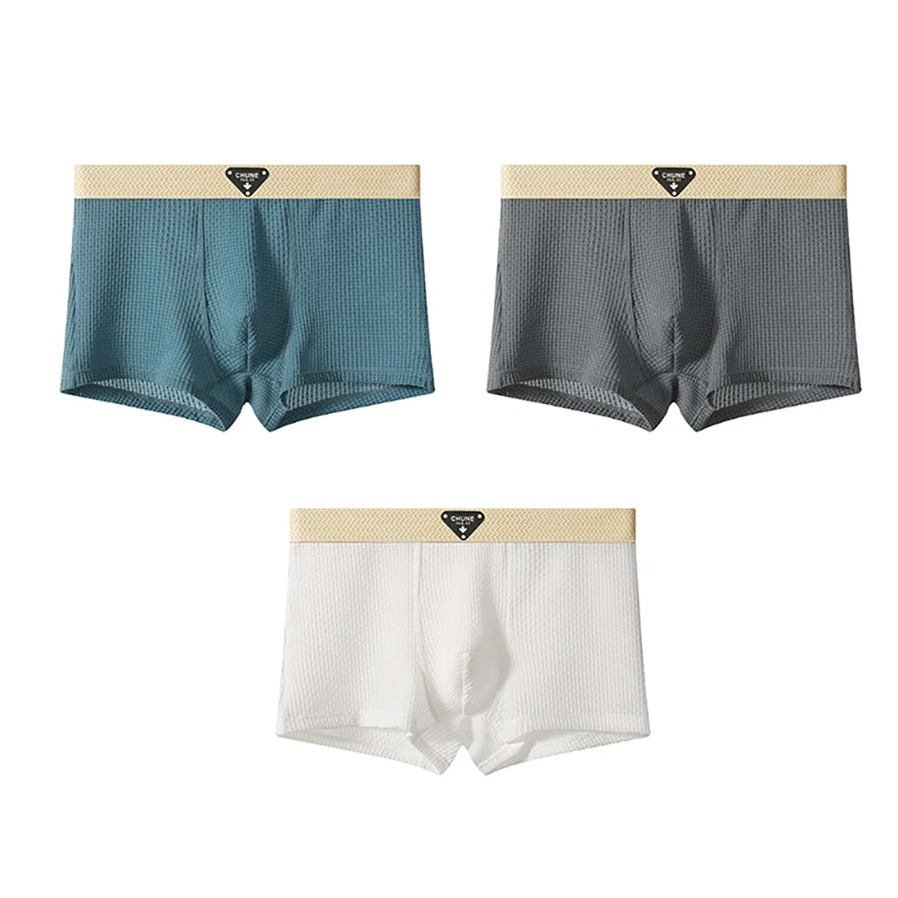 Men's fitted boxer briefs three-piece set in neutral tones with textured finish and logo waistband