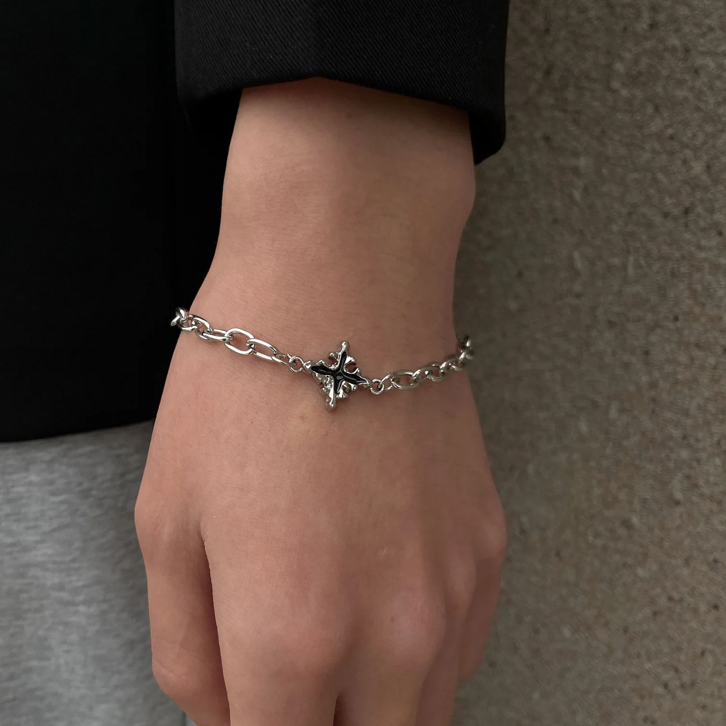 Stainless steel chain link bracelet with interlinked cross design, unisex bold fashion accessory