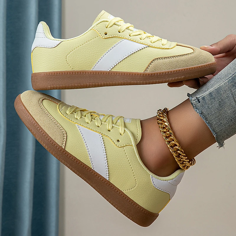 Leopard-print suede sneaker with smooth leather accents, cushioned gum sole, and hand-stitched welt