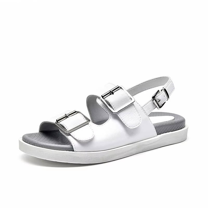 Women's leather platform buckle sandals in neutral tone, gladiator style with handcrafted open-toe silhouette