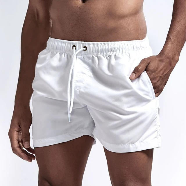 Men's gray quick-dry swim trunks with drawstring waist, comfort fit design for beach and active use