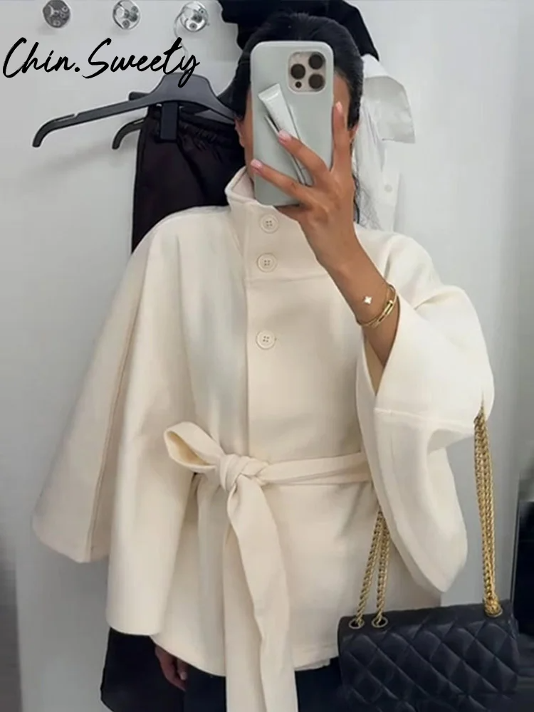 Women's wool blend cape jacket high neck belted waist draped silhouette elegant winter layer