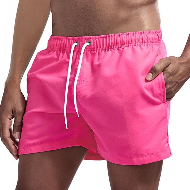Men's gray quick-dry swim trunks with drawstring waist, comfort fit beach shorts for active wear