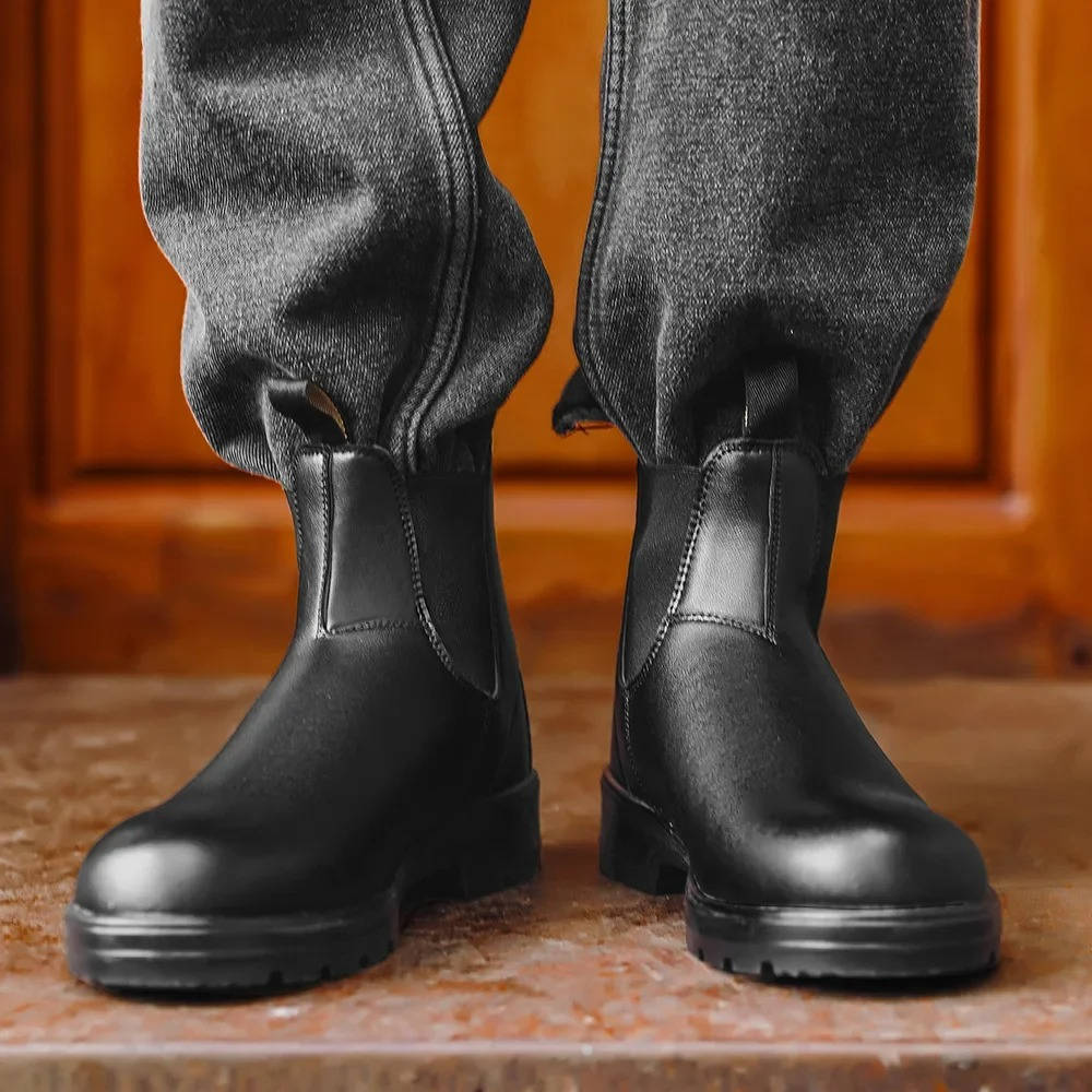 Men's black slip-on Chelsea boots with water-resistant leather upper and rugged lug sole