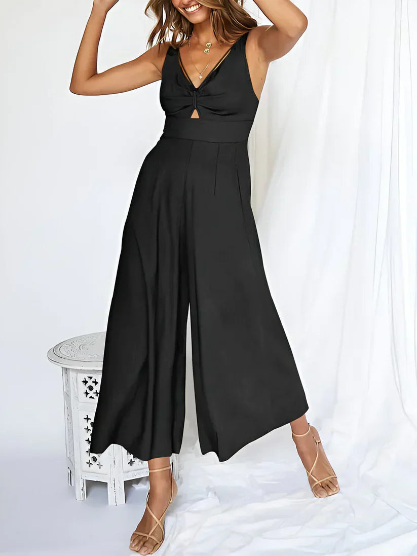 Navy sleeveless wide-leg jumpsuit with V-neck and high waist silhouette for women