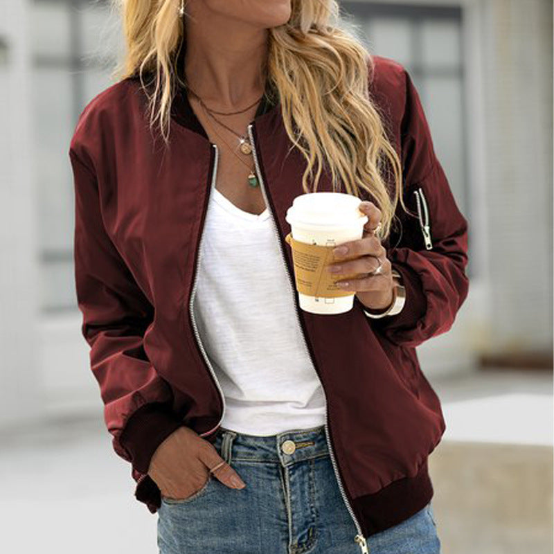 Women's lightweight zip-up bomber jacket in neutral tones, minimalist street-style silhouette for everyday layering