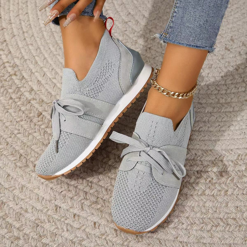 Unisex breathable mesh sneakers with gel cushioning sole in clean minimalist low-top style