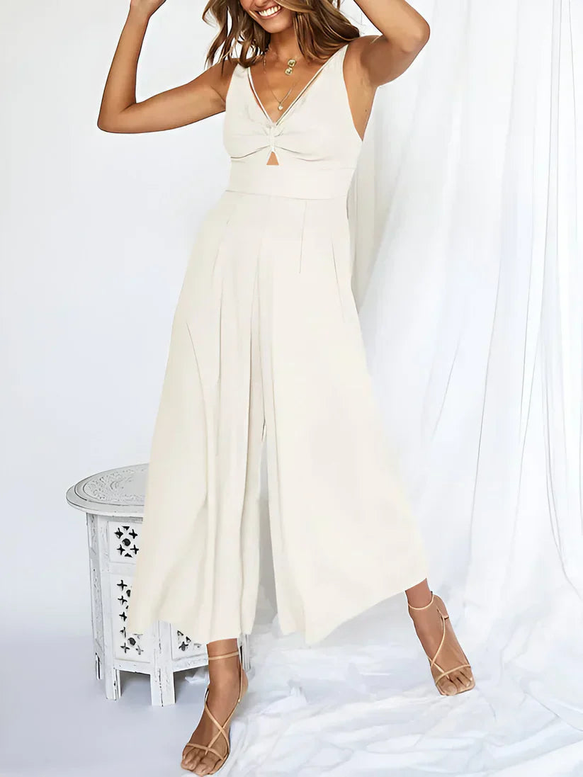 Navy blue sleeveless V-neck wide leg jumpsuit with high waist flattering silhouette for women